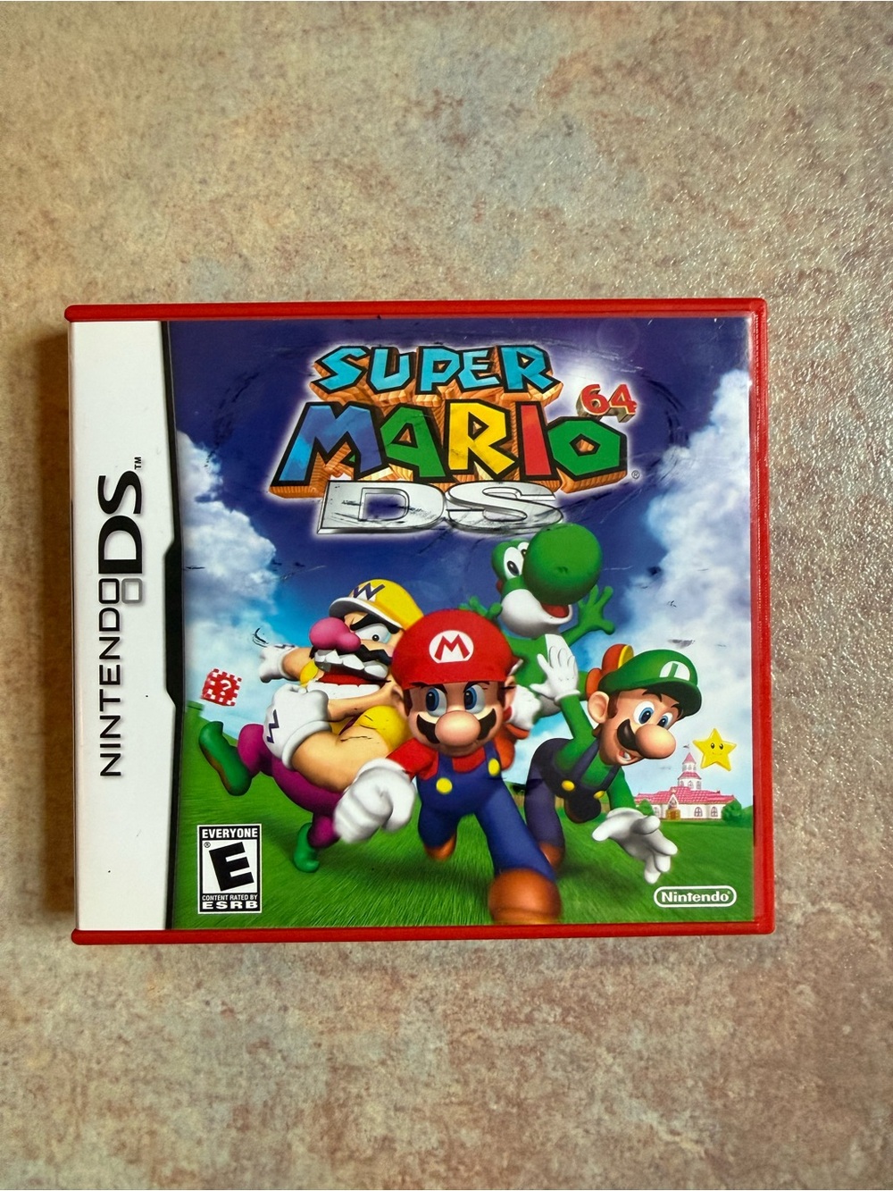 Nintendo Super Mario DS Game - Red Case with Colorful Artwork